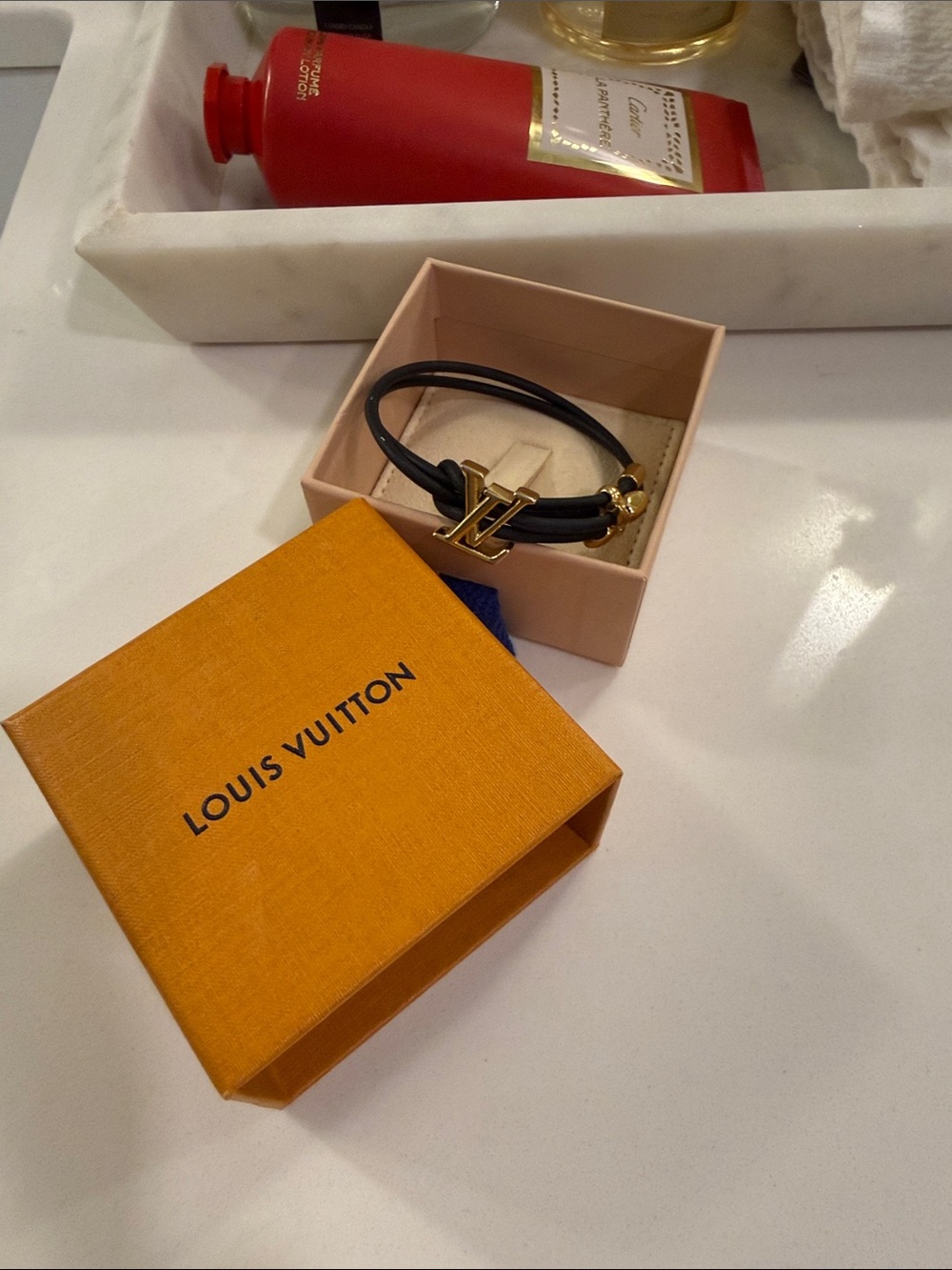 Louis Vuitton Black Bracelet with Gold LV Charm